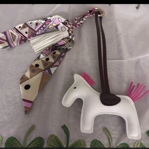 White Horse Charm Bag Accessory with Pink Accents